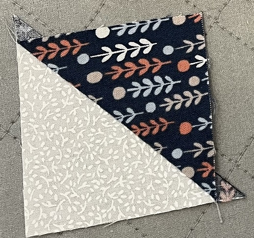 how to make a triangle quilt block square